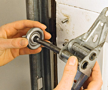 broken garage door roller repair in Clarendon